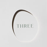 Table Numbers — Pebble